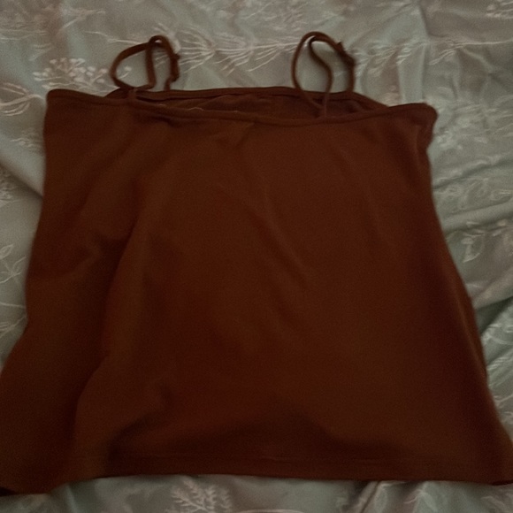 This is a walking on sunshine buttoned brown cropped tank top! Great for spring! - Picture 2 of 2